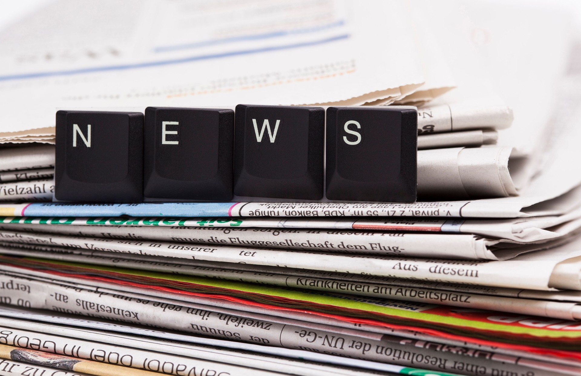 Closeup stack of newspapers